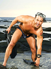 Straight swimmer guy showing his tool
