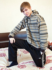 Cute skinny boy strips off to show all his goods