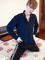 Cute skinny boy strips off to show all his goods