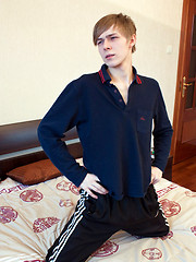 Cute skinny boy strips off to show all his goods