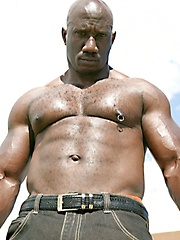 Big black man showing his nude and hairy chest