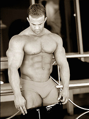 Strong bodybuilder from Miami beach posing for us camereman