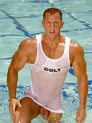 Muscle man  in a pool