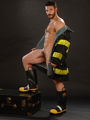 Big fireman shows his muscle naked body