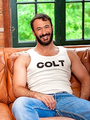 Amazing gay porn star Wilfried Knight demonstrates his nude hairy chest