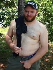 Ginger cub Sid Morgan strips naked outdoors to show off his chubby cock